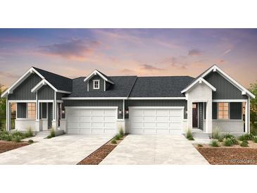 Charming paired home featuring a contemporary design, two-car garage, and inviting curb appeal at 3411 N Denali St, Aurora, CO 80019