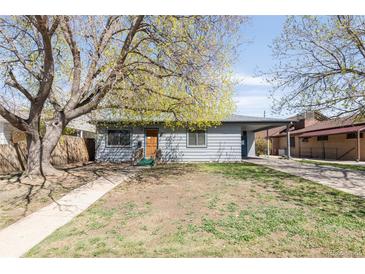 Charming single story home with mature landscaping and covered parking space at 5567 E Asbury Ave, Denver, CO 80222