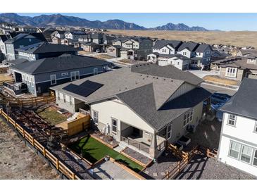 Charming single-Gathering home featuring a well-maintained yard and mountain views in a suburban neighborhood at 17412 W 93Rd Pl, Arvada, CO 80007