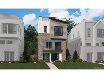 Stunning modern home with a brick and gray exterior, complimented by well-manicured landscaping at 11475 E Briarwood Cir, Centennial, CO 80112