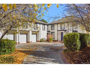 Beautiful home with a three car garage and well maintained front yard at 2 Fieldstone Trl, Englewood, CO 80113