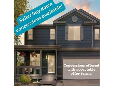 Charming two-story home with a covered front porch and well-maintained landscaping offers seller concessions at 5249 Mt Arapaho Cir, Frederick, CO 80504