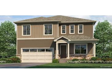 Beautiful two-story home featuring a two-car garage and a charming covered front entrance at 6513 14Th St, Frederick, CO 80530