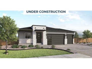 A modern style single-story home with a two-car garage and neutral color palette at 456 Clear Bell Ln, Monument, CO 80132