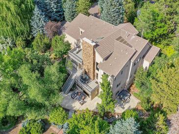 Luxury home with expansive backyard and mature trees at 6325 E Tufts Ave, Cherry Hills Village, CO 80111