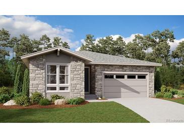 Single-story home with stone accents and a two-car garage at 24779 E 39Th Ave, Aurora, CO 80019