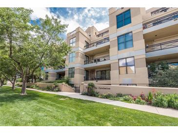 Inviting condo complex featuring well-manicured landscaping, secure entry, and private balconies in a desirable location at 180 N Cook St # 509, Denver, CO 80206
