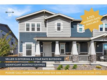 Charming two-story home with gray and blue siding, front porch, and 3.75% interest rate available at 21413 E 59Th Pl, Aurora, CO 80019