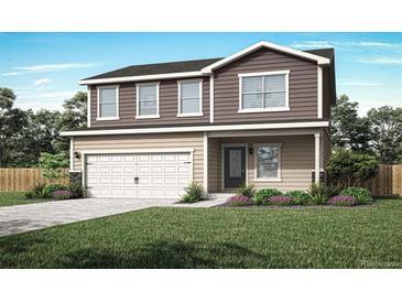 Charming two-story home with a well-manicured lawn, two car garage and inviting curb appeal at 48255 Shetland Dr, Bennett, CO 80102