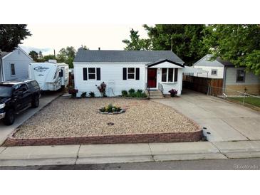 Charming single-story home with a gravel front yard, RV parking, and inviting curb appeal at 3111 W Bails Pl, Denver, CO 80219