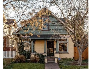 Charming single-Gathering home with mature landscaping and inviting front porch in a desirable neighborhood at 368 S Humboldt St, Denver, CO 80209