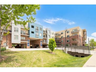 A modern multi-Gathering home featuring colorful accents, well-manicured lawns, and easy access to parking at 3401 Arapahoe Ave # 105, Boulder, CO 80303