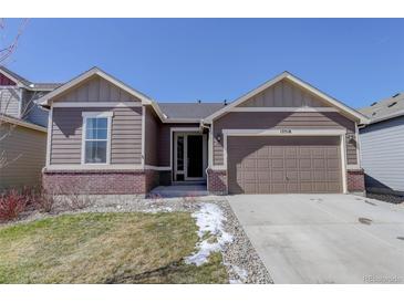 Charming single-Gathering home with a well-maintained lawn and a two-car garage at 17718 Leisure Lake Dr, Monument, CO 80132