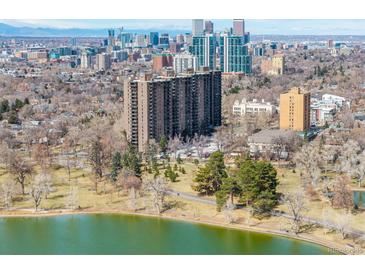 Enjoy breathtaking city views from this high-rise condo near a serene park and lake at 460 S Marion Pkwy # 1106, Denver, CO 80209
