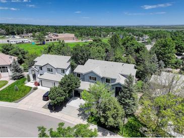 Beautiful two-story home with mature trees and manicured lawn in a desirable neighborhood at 787 Eldorado Dr, Superior, CO 80027