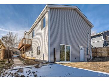 Gray house exterior with deck and ramp access at 3338 S Canosa Ct, Englewood, CO 80110