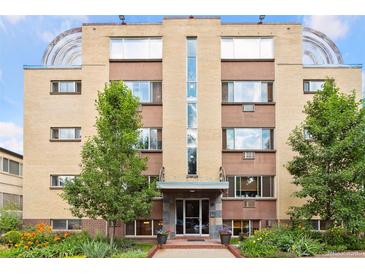 Well-maintained apartment building with landscaping at 10 N Ogden St # 5, Denver, CO 80218
