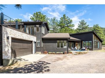 Stunning home features a three-car garage and second story balcony at 37 Wagner Cir, Boulder, CO 80304