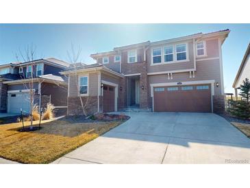 Charming two-story home with a two car garage and appealing exterior at 3062 Grizzly Peak Dr, Broomfield, CO 80023