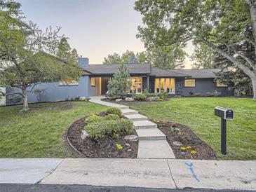 Charming single-story home boasting a manicured front yard, walkway, and inviting curb appeal at 3961 S Clermont St, Cherry Hills Village, CO 80113
