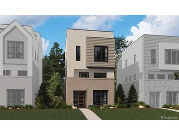 Modern home with brick facade, large windows and neutral color palette in a suburban setting at 11487 E Briarwood Cir, Centennial, CO 80112