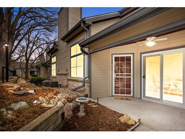 Inviting entryway with a well-maintained exterior, manicured landscaping, and a welcoming front door at 4301 S Pierce St # 6D, Littleton, CO 80123