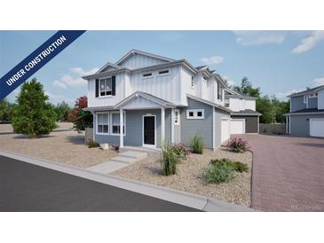 Charming two-story home featuring Hardie siding, a welcoming porch, a 2-car garage, and professional landscaping at 46549 Sunflower Ln, Bennett, CO 80102