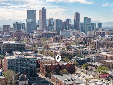 Beautiful Denver city skyline view from this charming brick apartment building, in a walkable neighborhood at 1475 N Humboldt St # 22, Denver, CO 80218