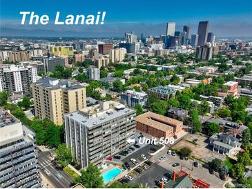 Stunning aerial view of the city skyline from this apartment complex featuring a sparkling community pool at 800 N Washington St # 508, Denver, CO 80203