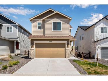 Charming two-story home with a large two-car garage and well-maintained landscaping at 16470 Mountain Flax Dr, Monument, CO 80132