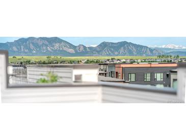 Balcony view of Colorado mountains and the surrounding community at 2282 Old Rail Way, Superior, CO 80027