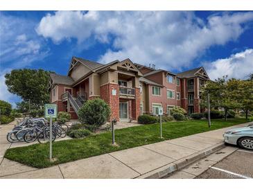 Attractive condo complex boasts maintained landscaping, accessible parking and inviting brick and siding accents at 804 Summer Hawk Dr # 5105, Longmont, CO 80504