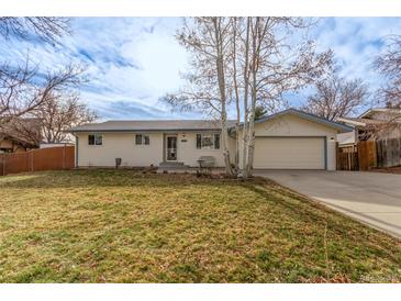 Ranch style home with attached garage and spacious yard at 3460 W 131St Ave, Broomfield, CO 80020