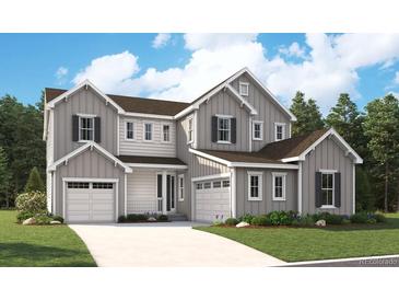 Two-story house with gray siding, white trim, and a two-car garage at 5597 Riverbend Ave, Firestone, CO 80504