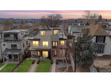 Aerial shot of the property showcasing its rooftop deck and neighborhood views at 2723 Grove St, Denver, CO 80211