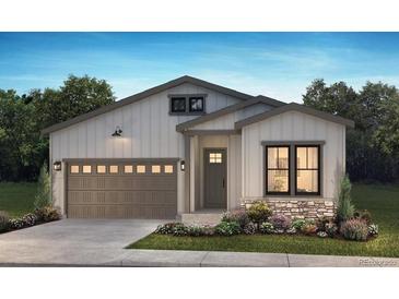 Charming single-story home with stone accents, a modern garage door, and a well-manicured lawn at 11106 Stonepath St, Littleton, CO 80125