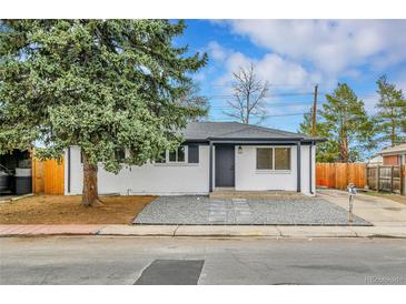 Charming home featuring a well-maintained front yard and freshly painted exterior at 12801 Randolph Pl, Denver, CO 80239
