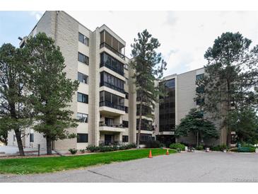 Apartment building featuring well-maintained landscaping and architecture at 13902 E Marina Dr # 303, Aurora, CO 80014