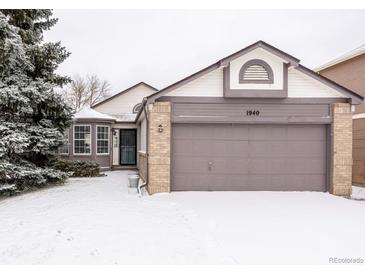 Charming home featuring a two-car garage, and a well-maintained lawn, perfect for Gathering living at 1940 W 101St Ct, Thornton, CO 80260