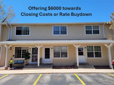 Inviting townhouse featuring a well-maintained facade and convenient parking at 8901 Field St # 81, Broomfield, CO 80021