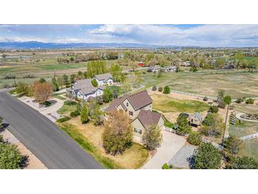 Expansive home on acreage with beautiful landscaping and mountain views at 3225 Rinn Valley Dr, Longmont, CO 80504