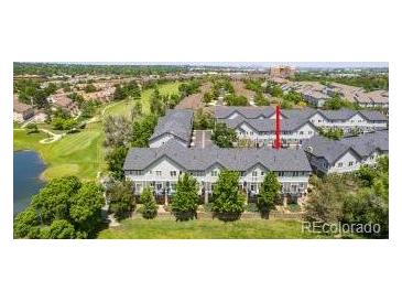 Beautiful townhomes with a lake and golf course creating an idyllic community at 2945 W Riverwalk Cir # B, Littleton, CO 80123