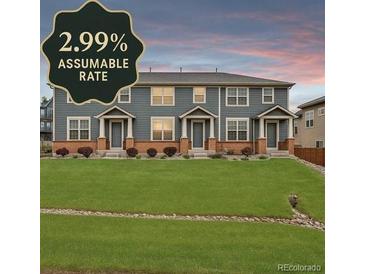 Inviting townhome with a well-manicured lawn and an assumable interest rate of 2.99% at 8237 W 54Th Ave # 2, Arvada, CO 80002