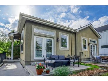 Cozy patio with a charming seating area, perfect for outdoor relaxation and entertaining at 2479 S High St, Denver, CO 80210