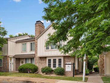 Charming two-story townhome with brick accents, mature landscaping, and a classic chimney at 3086 W 107Th Pl # F, Westminster, CO 80031