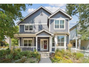 Charming two-story home with a welcoming front porch and well-maintained landscaping at 2120 Pintail Dr, Longmont, CO 80504