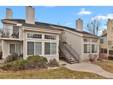 Charming multi-level exterior with a private entrance, featuring well-maintained landscaping and a cozy balcony at 13732 E Lehigh Ave # H, Aurora, CO 80014