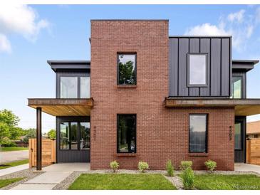 Modern two-story home showcases a striking brick facade and dark metal accents at 4301 Osceola St, Denver, CO 80212