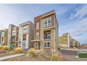 Modern two-story home featuring mixed materials, a small balcony, and xeriscaping at 3574 Corsica Way, Castle Rock, CO 80109