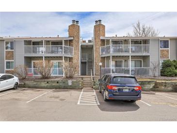 Condo with stone accents, balconies, and parking at 18302 E Kepner Pl # 207, Aurora, CO 80017